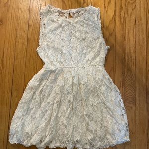 Beautiful white lace mini-dress 
Zip back.